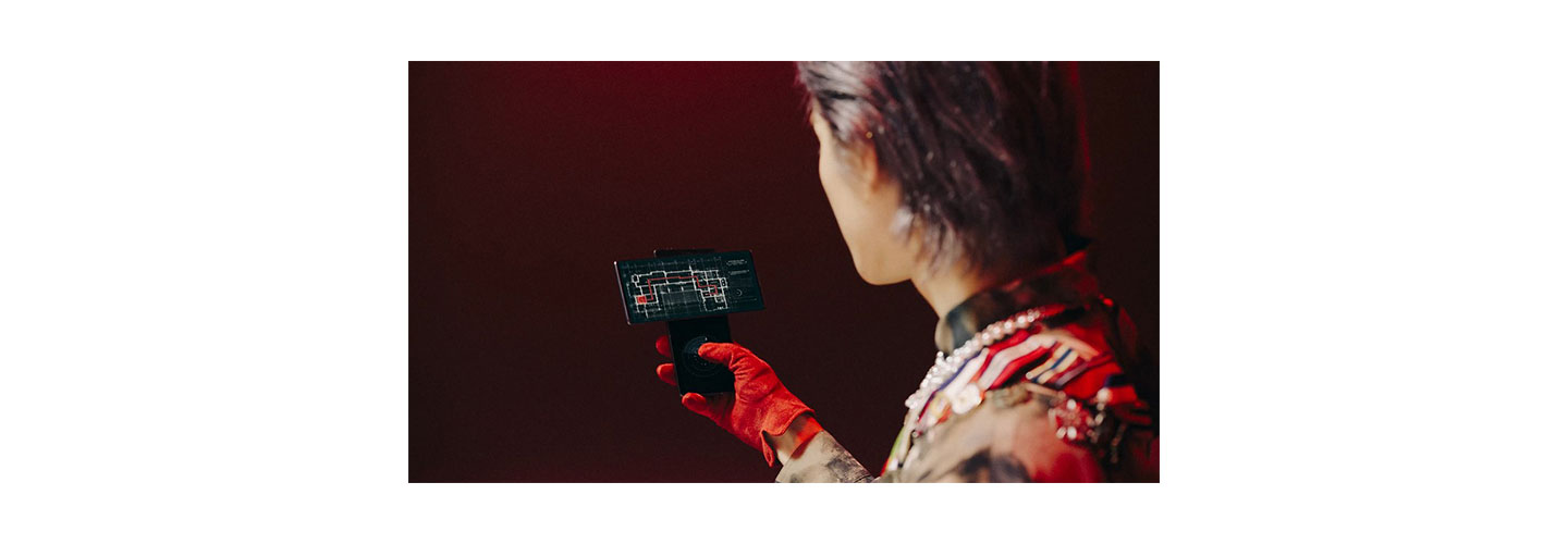 Taeyong, member of K-pop supergroup SuperM, checking the map on his LG WING in Swivel Mode during SuperM's music video