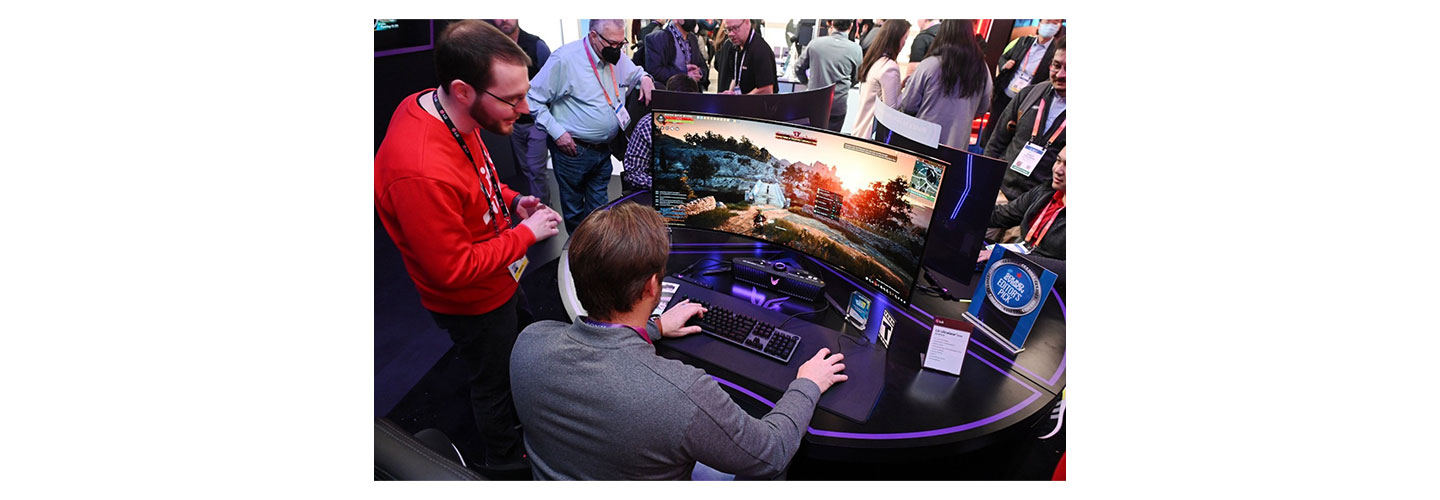 Visitors to LG booth enjoying an online game with LG UltraGear monitors