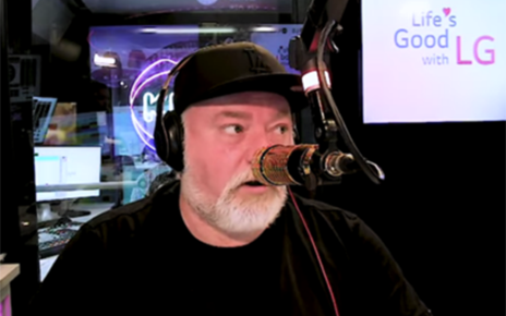 Kyle Sandilands, the host of KIIS FM, presenting a surprise giveback radio segment for families affected by the floods
