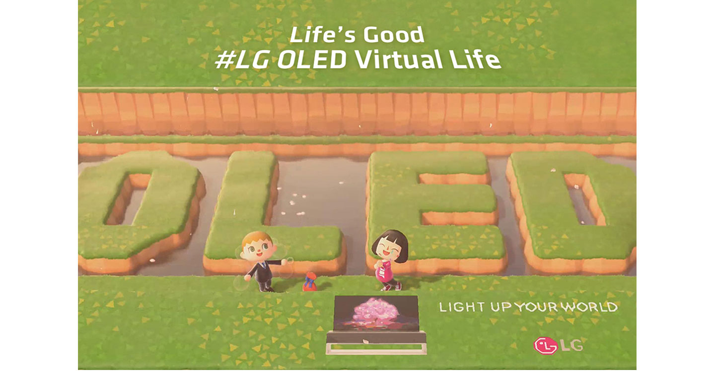 Two player avatars in popular Nintendo game 'Animal Crossing' pose with the LG OLED TV and 'OLED’ lettering, which have been terraformed into the pond behind them.