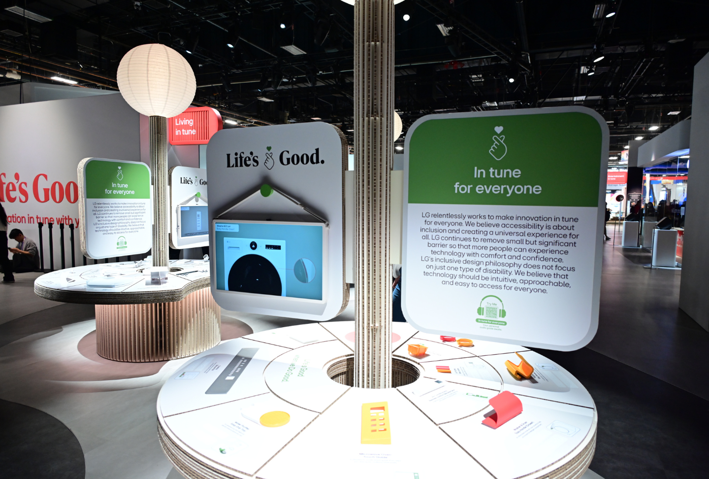 Graphics throughout the In Tune for Everyone zone explain LG's "Life's Good" brand message.