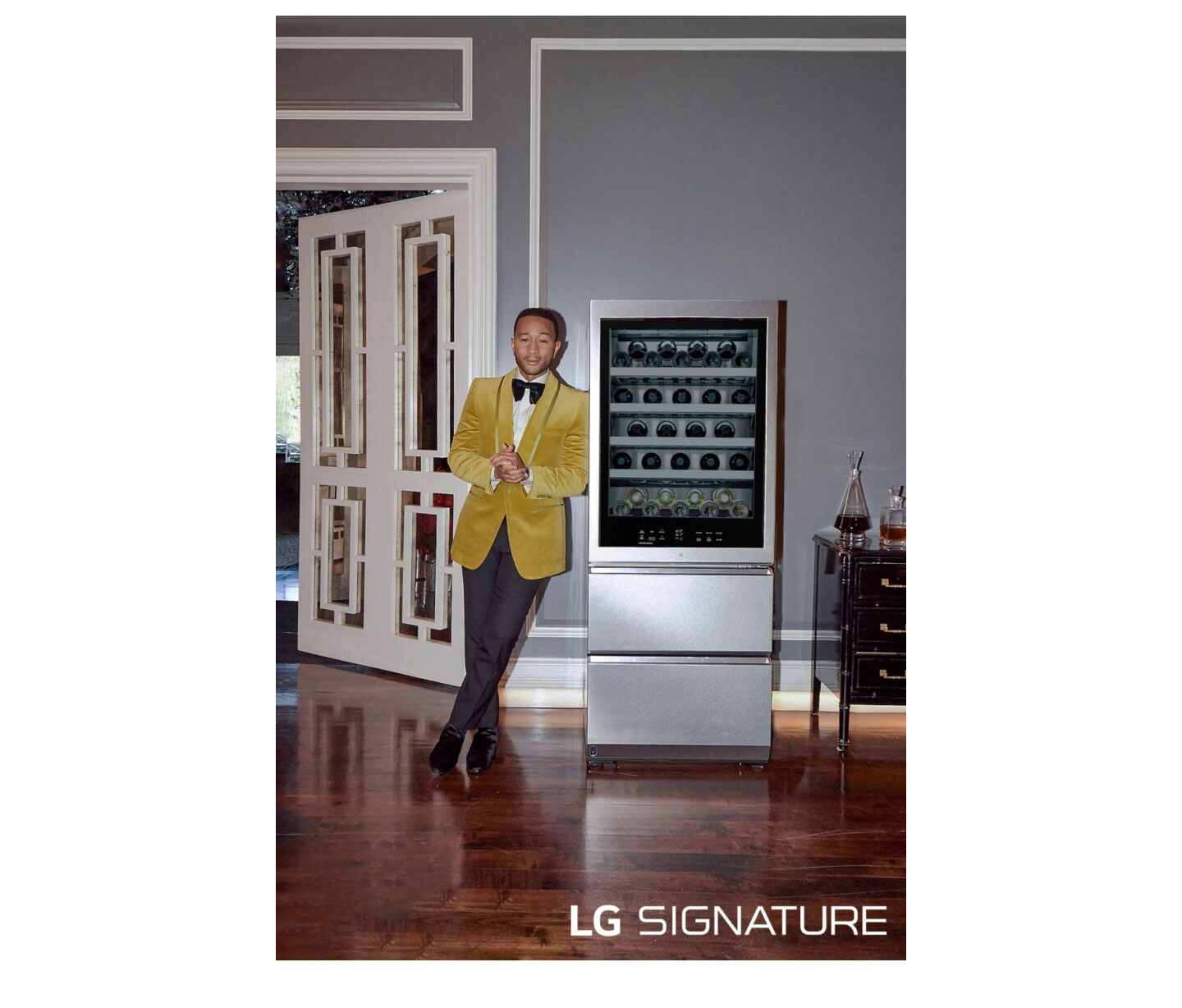 An image of John Legend leaning against LG SIGNATURE Wine Cellar