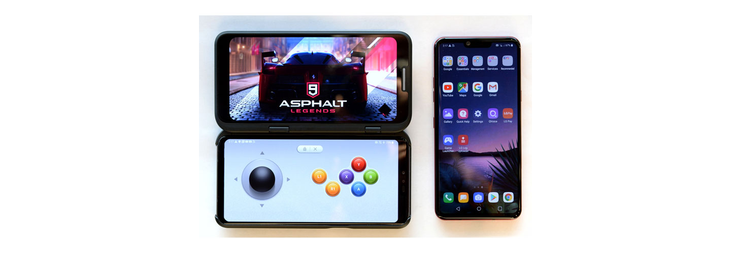 The front view of the LG V50 ThinQ 5G connected to the LG Dual Screen, with the Asphalt 9 Legends game on the top and LG Game Pad on the bottom, next to the LG G8 ThinQ