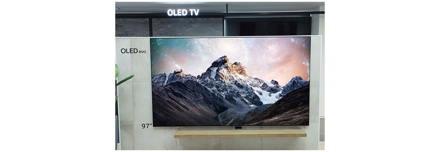 LG OLED evo C2 Series displayed on a wall