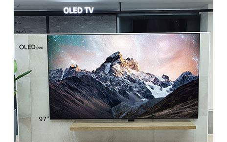 LG OLED evo C2 Series displayed on a wall