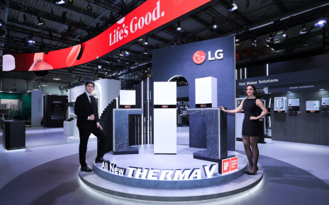 A man and a woman stand beside LG’s Therma V™ indoor units at the company’s booth during MCE 2026.