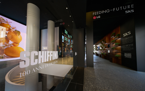 At the entrance to the SKS showroom, a glass sign reading “SCHIFFINI” marks the entrance to an exhibition space, with SKS branding and signage reading “Feeding the Future.” 