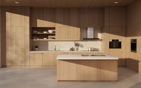 LG’s built-in full kitchen package, including a hood-integrated induction cooktop and ovens, is displayed in a minimalist kitchen setting with light wood cabinetry and an island countertop.