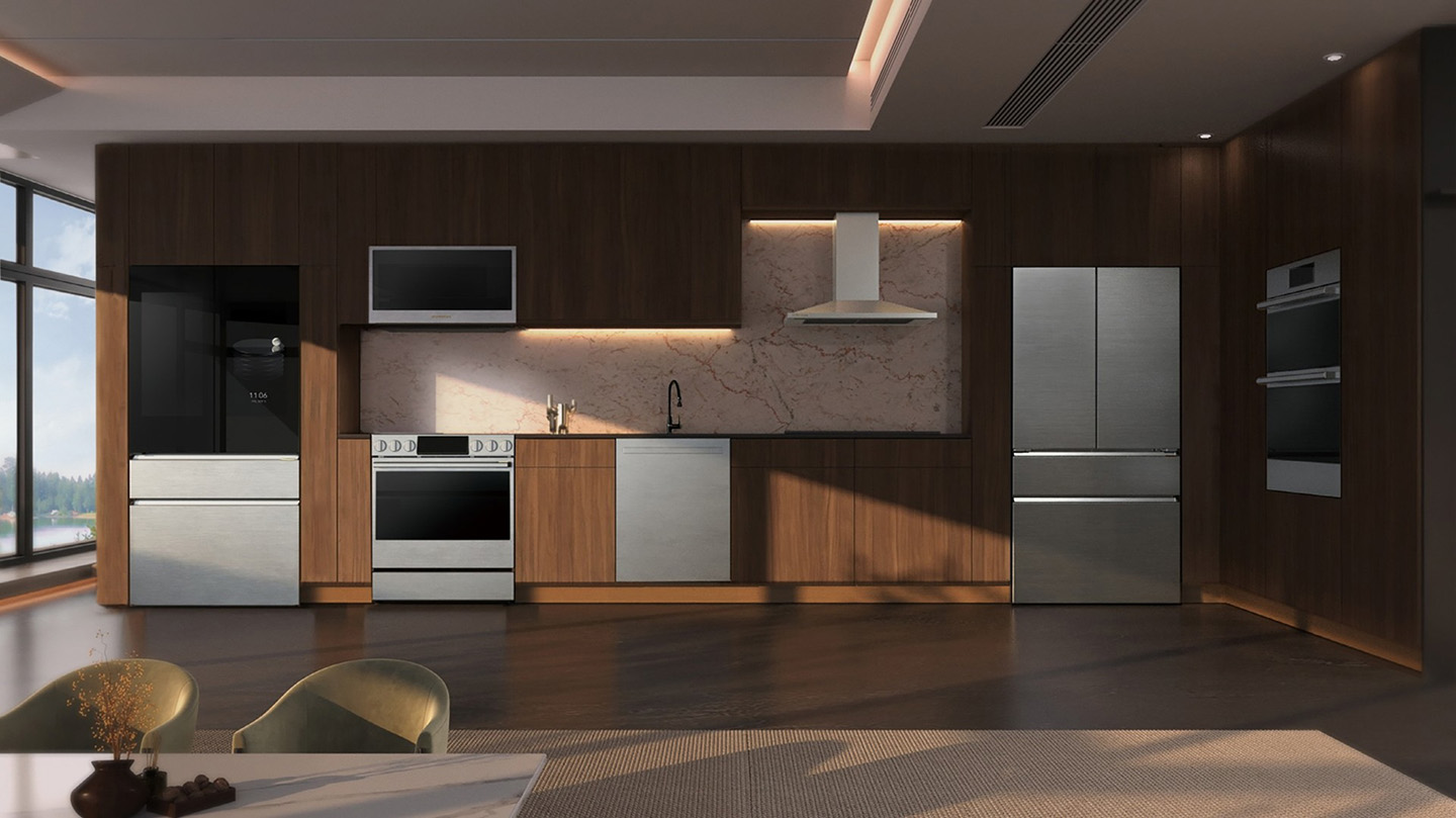 The LG SIGNATURE Smart InstaView™ refrigerator, LG SIGNATURE Oven Range, LG SIGNATURE dishwasher and new LG SIGNATURE refrigerator are displayed in a modern kitchen setting with dark wood cabinetry.