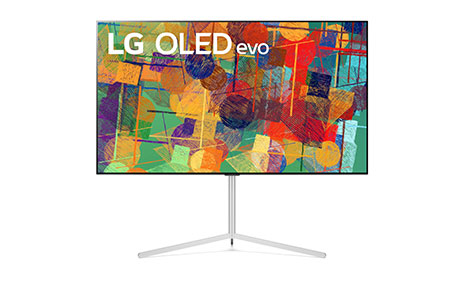 Front view of LG's 65-inch OLED evo G1 on its stand while displaying a colorful abstract artwork on its screen