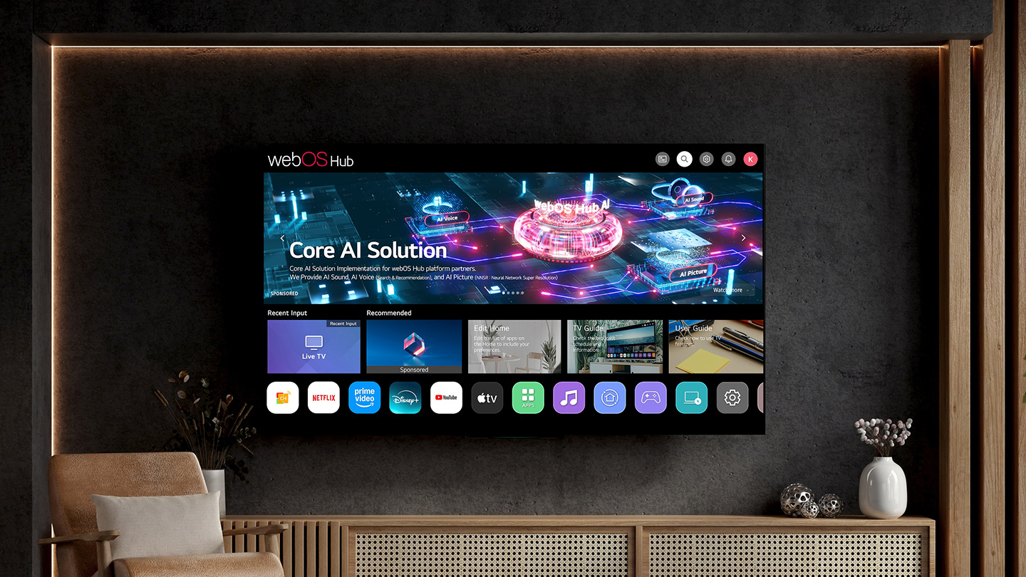 A sleek wall-mounted LG Smart TV features the webOS Hub interface, displaying its 'Core AI Solution' and a variety of apps.