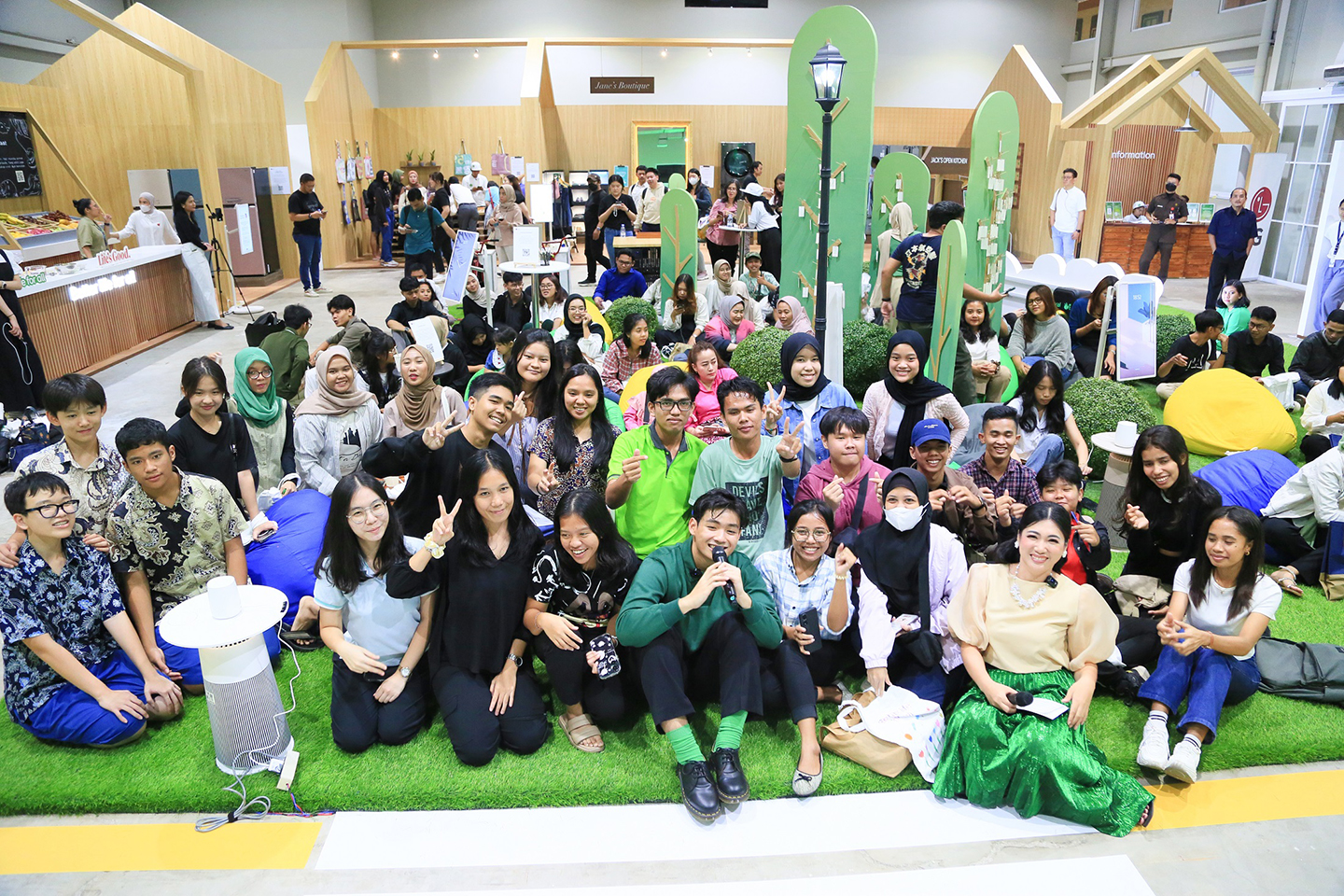A group photo of people smiling and posing at the Better Life Festival