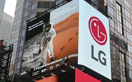 a photo of LG Hope Screen on the building with astronaut inside the screen 