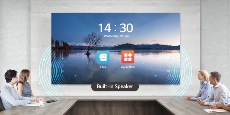 People have a meeting while watching the display and listening sound with the LAEC and its built-in speaker, installed in the meeting room.
