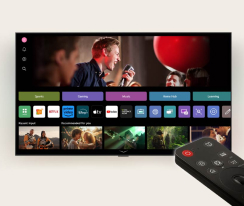 Family of four is gathered around an LG AI TV. A circle appears around the person holding the remote showing their name. This showcases how AI Voice ID recognizes each user's voice signature. The webOS interface then shows how the AI automatically switches the account and recommends personalized content.