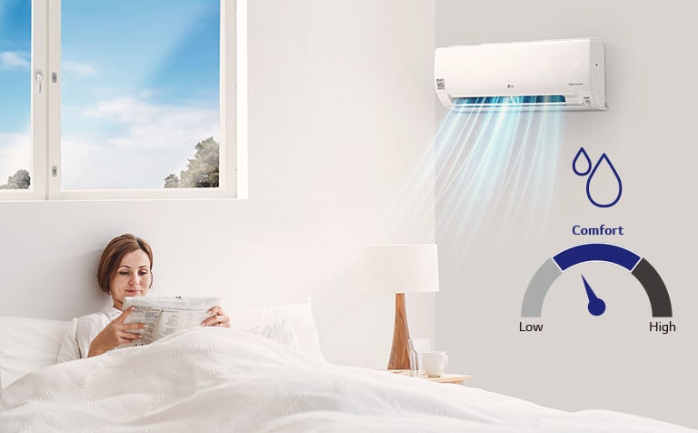 A woman lies in bed, absorbed in her newspaper. Back window reveals a blue sky, while an lg hvac air conditioner(AC) on the right providing cool air.