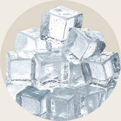 A pile of small, clear ice cubes stacked together.