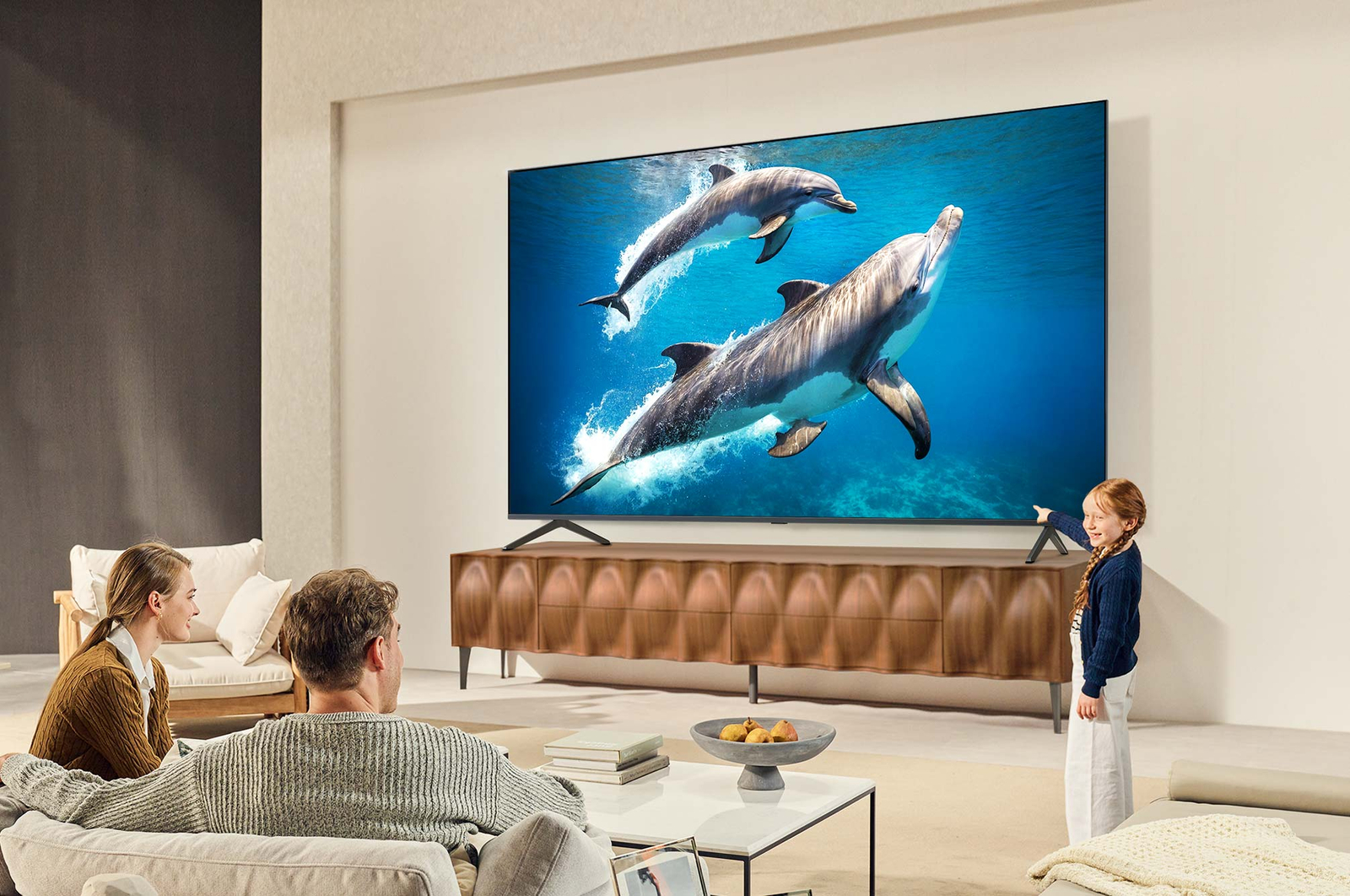 Sci-fi content is playing on an LG QNED TV screen. On the screen is the AI Chatbot interface. The user messaged the chatbot saying that the screen is too dark. The chatbot offered solutions to the request. The whole scene is also split in two. One side is darker, the other side is brighter, showing how AI Chatbot solved the issue for the user automatically. Text explains AI Chatbot can understand user intent and provide solutions to troubleshoot.