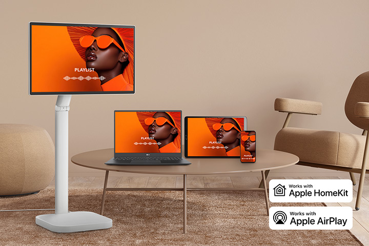 The same screen is being shared across a LG Smart Monitor Swing, laptop, tablet, and smartphone using AirPlay 2 and Screen Share.