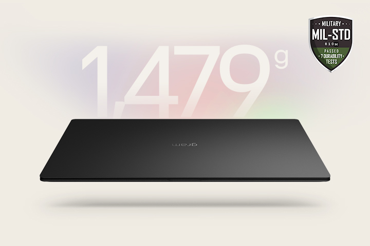 An animation showcasing a lightweight laptop with '1,479g' displayed in the first frame and '14.5mm' thickness in the second frame. Both frames include the MIL-STD durability badge, emphasizing portability and durability.