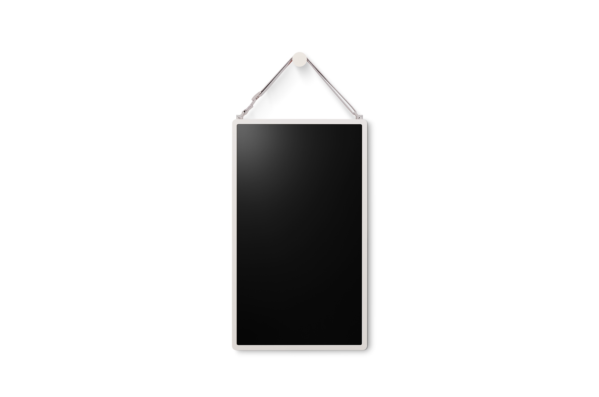 LG StanbyME 2 is hung on the wall using the wall strap.