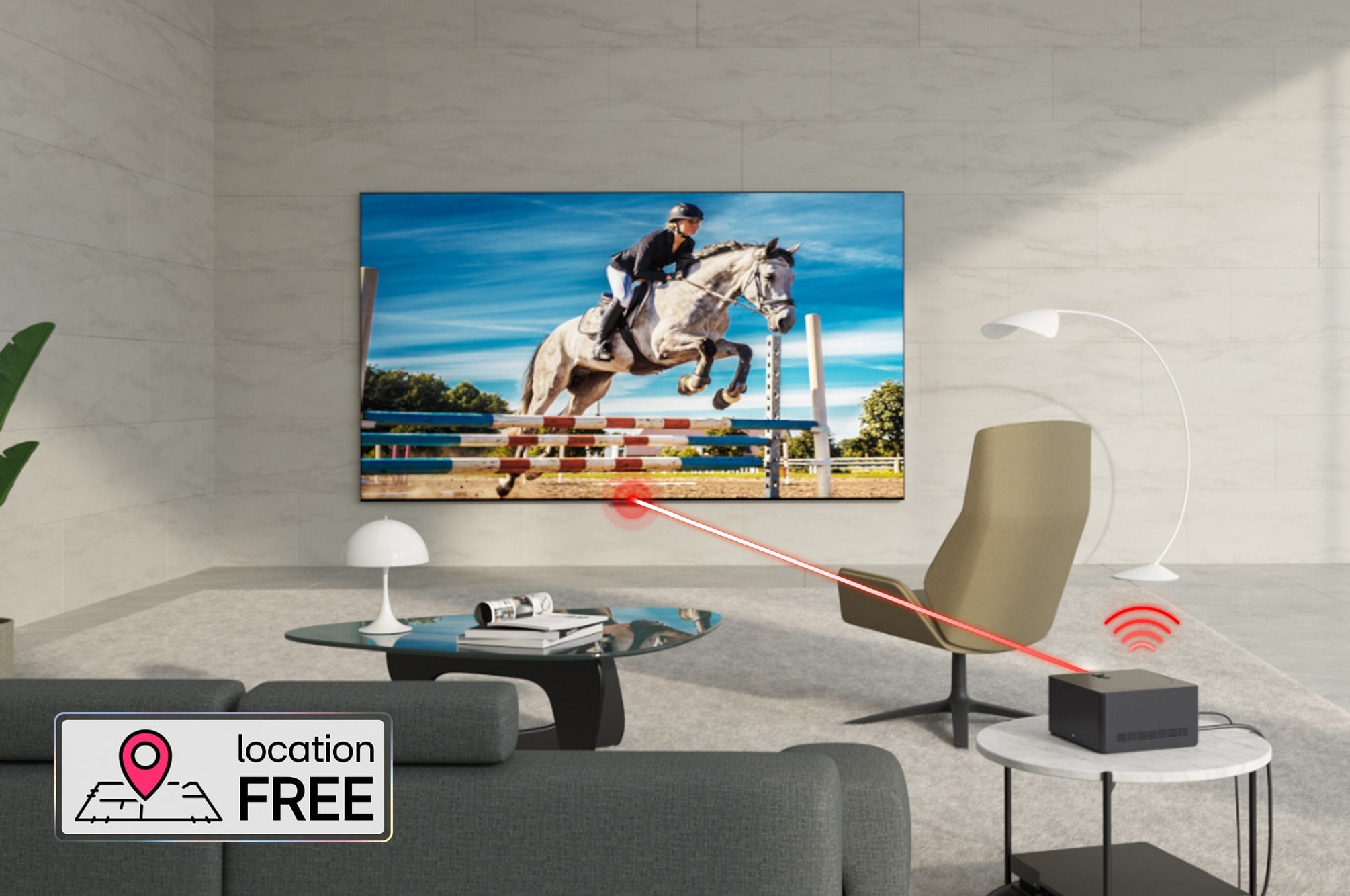 An LG OLED evo M4 mounted on a marbled wall of a bright, modern living room. A Zero Connect Box on a table behind other furniture, and a red Wi-Fi signal and red beam emitting towards the TV. The words "location FREE" in the bottom left corner.