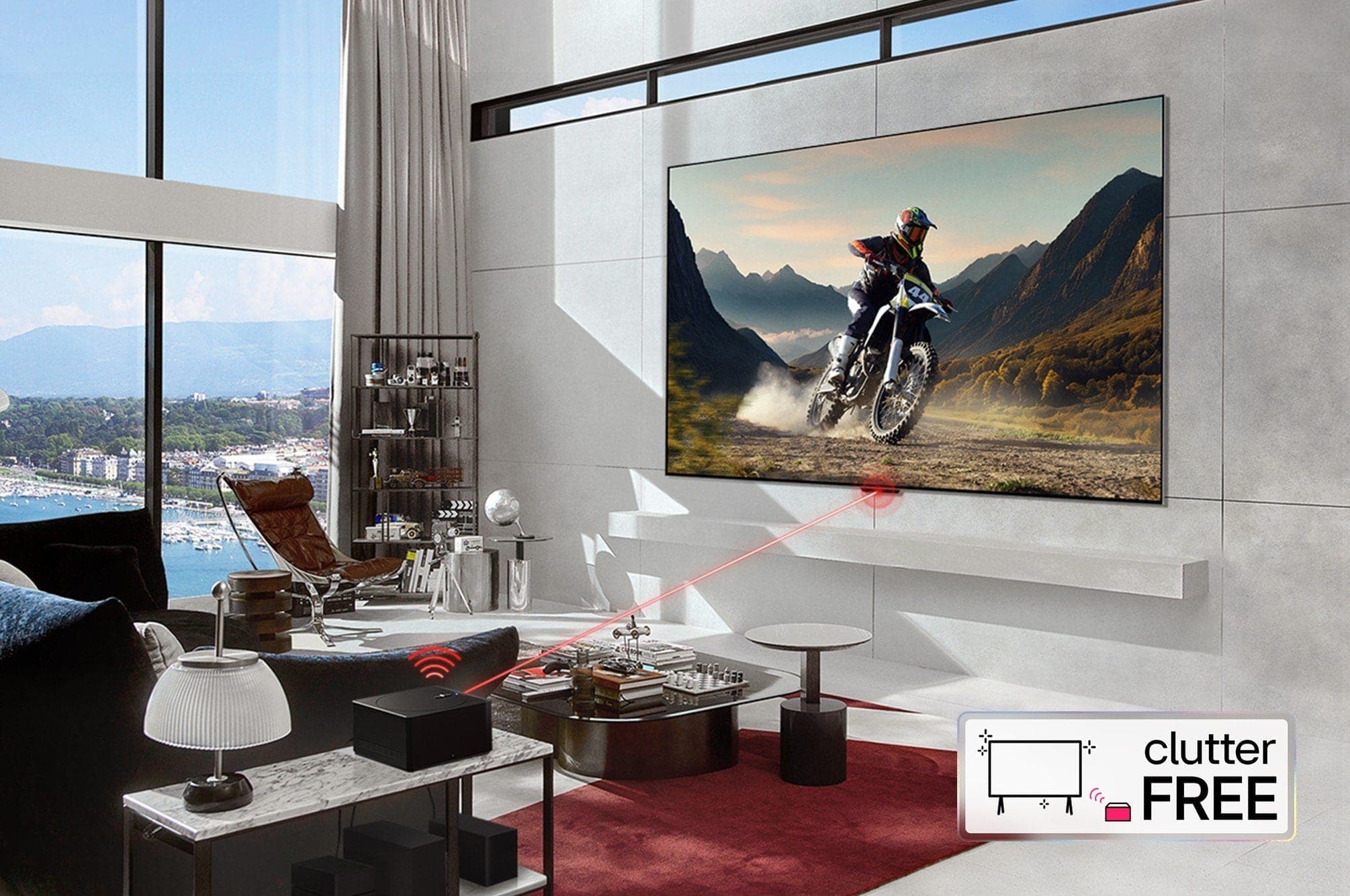 An LG OLED evo M4 within an angled perspective mounted on the wall of a bright, modern living room. A Zero Connect Box on a table in front, and a red Wi-Fi signal and red beam emitting towards the TV. The words "clutter FREE" in the bottom right corner.