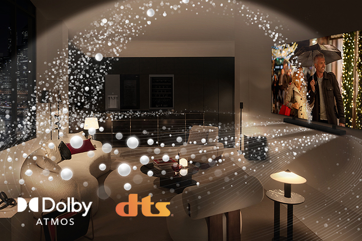 A movie plays on an LG OLED TV and LG Soundbar in a modern city apartment in a side angle view. White beads depicting sound waves project upwards and downwards from the Soundbar and TV, creating a dome of sound in the space.  Dolby Atmos logo DTS logo