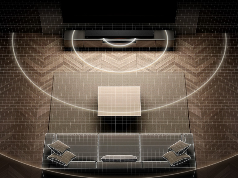 1) LG Sound Suite placed in a living room, demonstrating flexible speaker placement for an immersive home sound system 2) LG Sound Suite with Dolby Atmos FlexConnect technology detects each speaker’s location to optimize surround sound systems 3) Close-up of the LG Sound Suite W7 woofer with its driver showing deep bass performance down to 29.5 Hz