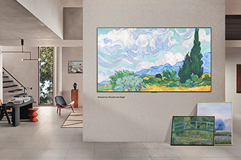 Interior of a sophisticated home. Lots of different artworks are displayed. On the center wall is an LG TV with popular artwork on the screen. The TV looks like a painting from a museum.