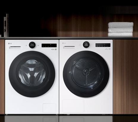 Interior image of a washing machine and dryer side by side.	