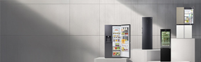 A variety of LG refrigerators in different sizes and formats are showcased side by side, with some doors open to reveal the interior storage layout.
