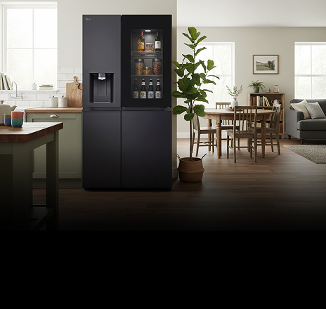 Side view of a kitchen with a built-in black InstaView fridge freezers.