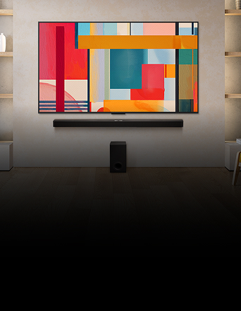 Large QNED TV in cozy living room showing vivid sunset over coastal lighthouse.
