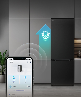LG bottom freezer (GBBW726AEV) with smartphone showing ThinQ app in front and glowing light blue AI icon beside fridge