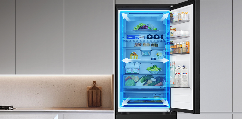 LG bottom freezer (GBBW726AEV) fully open with upper fridge compartment showing food in drawers with blue overlays and arrows highlighting spacious interior