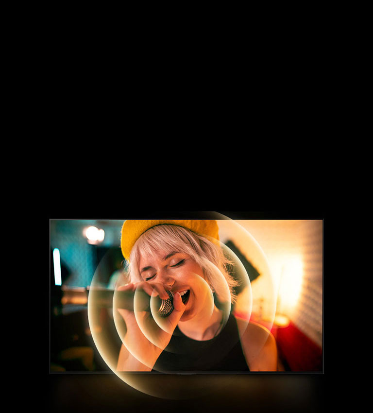 An image of a woman singing with the mic on her hand as there is a orange circle graphics around her mouth to show the soundscape.