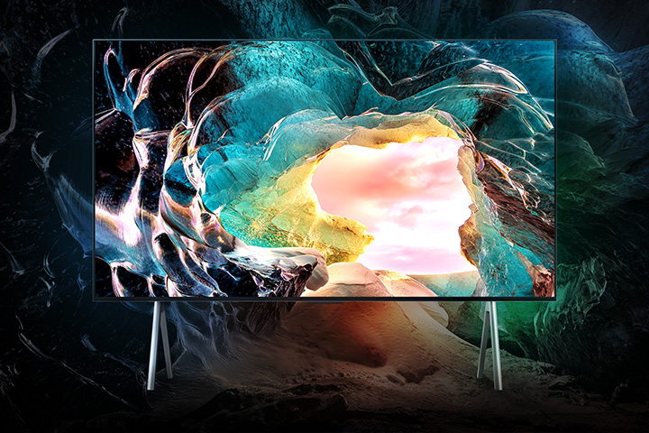 LG OLED M5 TV screen showing a cave interior looking out to the sky. Detail is impressive showing visually lossless 4K quality. 