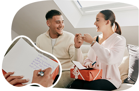 Image of siblings writing a letter	