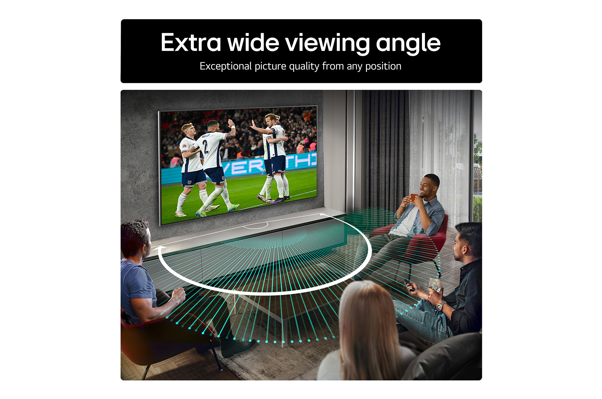 Living room space with a wall-mounted LG OLED TV. On the TV is a mountain range against a dark evening sky filled with stars. This scene is split in half. One side shows a duller, grayer version of the landscape labeled, Non Perfect Black display. On the other side is a more pleasing picture with a larger dynamic range of blacks and whites. 