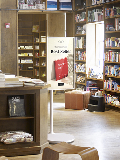 StanbyME is placed in the middle of furniture ateliar, and the TV screen shows Jazz music album cover image.