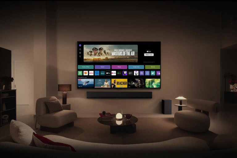 The webOS 24 home screen with Home Office, Game, Music, Home Hub, and Sports Categories. The bottom of the screen shows personalized recommendations under "Top picks for you."